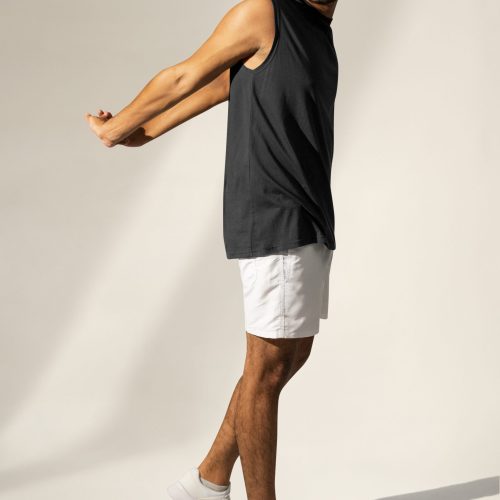 man-stretching-navy-tank-top-shorts-sportswear-apparel